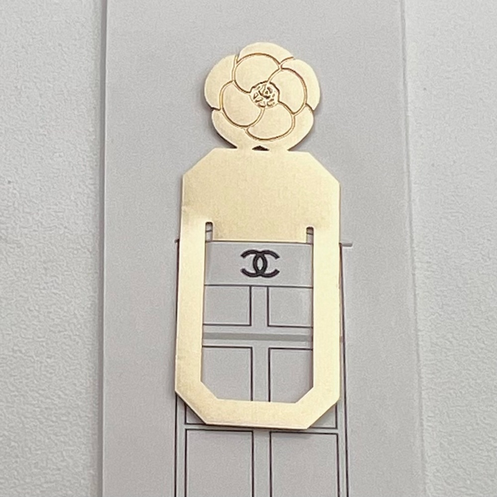 New CHANEL Gold Floral Bookmark